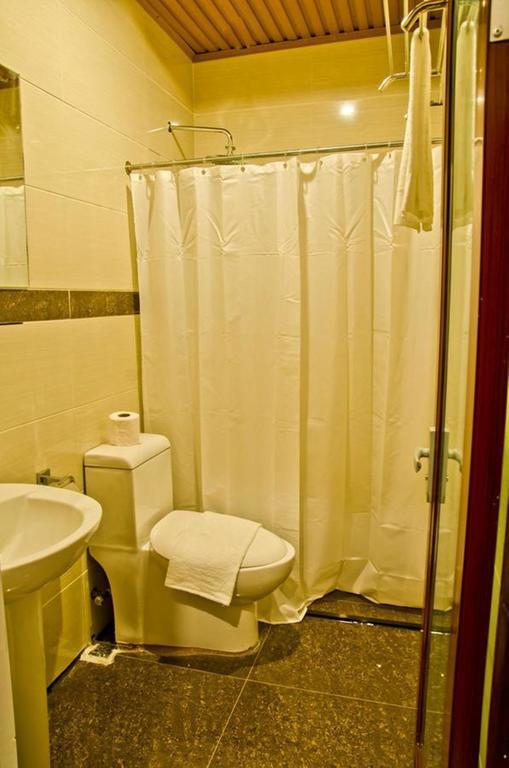 The Premiere Business Hotel Калибо Стая снимка